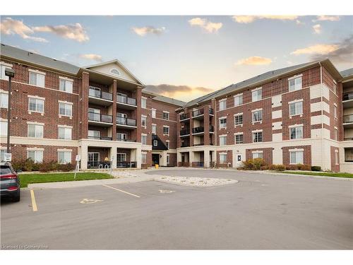 407-308 Watson Parkway N, Guelph, ON - Outdoor With Balcony With Facade