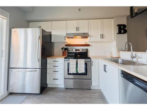 407-308 Watson Parkway N, Guelph, ON - Indoor Photo Showing Kitchen With Upgraded Kitchen