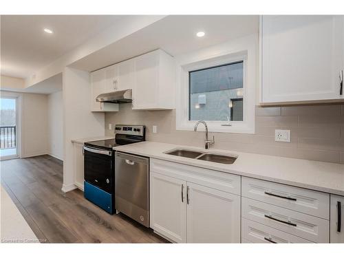 F021-15 Stauffer Woods Trail, Kitchener, ON - Indoor Photo Showing Kitchen With Double Sink