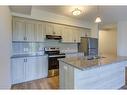 12-25 Isherwood Avenue, Cambridge, ON  - Indoor Photo Showing Kitchen With Double Sink With Upgraded Kitchen 