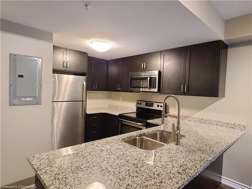 204-50 Bryan Court, Kitchener, ON - Indoor Photo Showing Kitchen With Stainless Steel Kitchen With Double Sink With Upgraded Kitchen