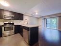 204-50 Bryan Court, Kitchener, ON  - Indoor Photo Showing Kitchen With Stainless Steel Kitchen With Upgraded Kitchen 