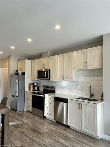 1702-104 Garment Street, Kitchener, ON - Indoor Photo Showing Kitchen With Stainless Steel Kitchen With Double Sink