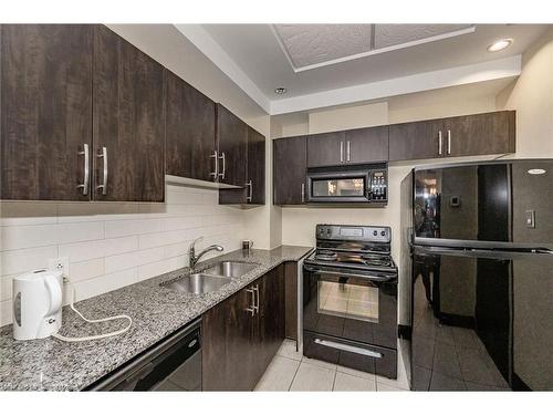 1510-3504 Hurontario Street, Mississauga, ON - Indoor Photo Showing Kitchen With Double Sink