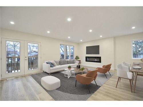 38 Dudhope Avenue, Cambridge, ON - Indoor Photo Showing Living Room With Fireplace