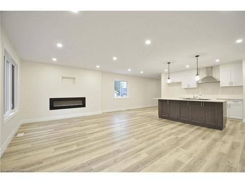 38 Dudhope Avenue, Cambridge, ON - Indoor Photo Showing Living Room With Fireplace