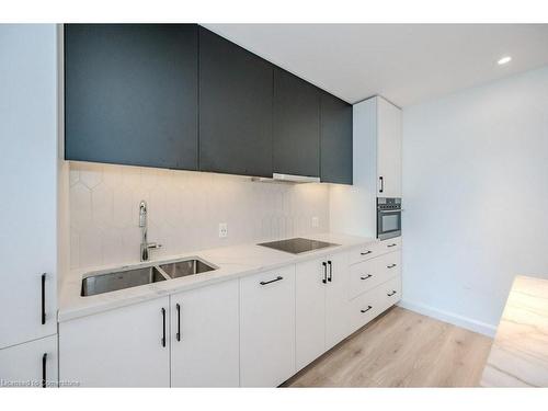 506-741 King Street West Street W, Kitchener, ON - Indoor Photo Showing Kitchen With Double Sink