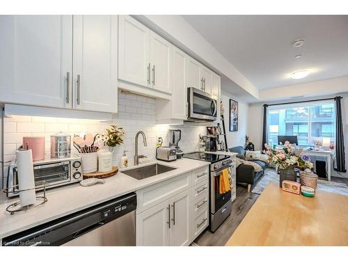 310-243 Northfield Drive E, Waterloo, ON - Indoor Photo Showing Kitchen With Upgraded Kitchen