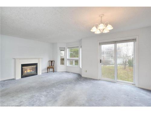 85 Eastforest Trail, Kitchener, ON - Indoor Photo Showing Living Room With Fireplace