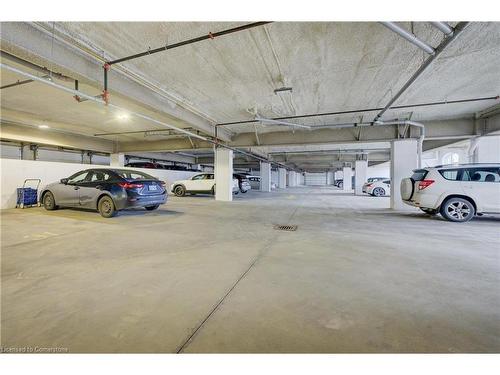 612-155 Water Street, Cambridge, ON - Indoor Photo Showing Garage