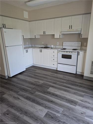 410-274 Erb Street W, Waterloo, ON - Indoor Photo Showing Kitchen With Double Sink