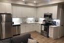 B105-112 Union Street E, Waterloo, ON  - Indoor Photo Showing Kitchen With Stainless Steel Kitchen With Double Sink 