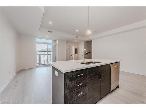 D054-142 Foamflower Place, Waterloo, ON - Indoor Photo Showing Kitchen With Double Sink