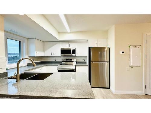 C34-350 Fisher Mills Road, Cambridge, ON - Indoor Photo Showing Kitchen With Double Sink