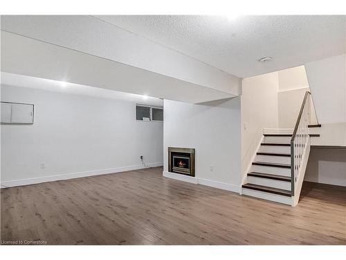 25-20 Paulander Drive, Kitchener, ON - Indoor Photo Showing Other Room With Fireplace