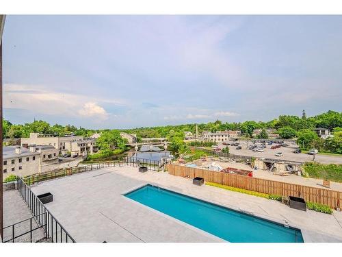 117-6523 Wellington 7 Road, Elora, ON - Outdoor With In Ground Pool With View