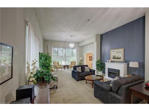 204-20 Berkley Road, Cambridge, ON - Indoor Photo Showing Living Room With Fireplace