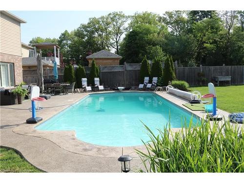 126 Robert Simone Way, Ayr, ON - Outdoor With In Ground Pool With Backyard