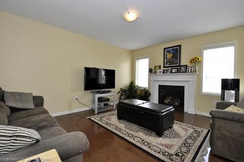 72 Senior Crescent, Cambridge, ON - Indoor Photo Showing Living Room With Fireplace