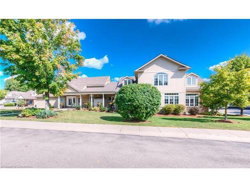 11D-350 Doon Valley Drive, Kitchener, ON - Outdoor With Facade