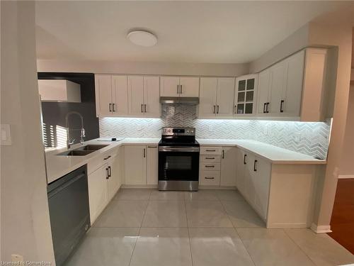 1449 Spring Garden Court, Mississauga, ON - Indoor Photo Showing Kitchen With Double Sink