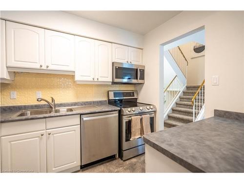 5-171 Ferguson Drive, Woodstock, ON - Indoor Photo Showing Kitchen With Double Sink