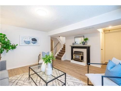 5-171 Ferguson Drive, Woodstock, ON - Indoor Photo Showing Living Room With Fireplace