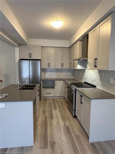 64-155 Equestrian Way, Cambridge, ON - Indoor Photo Showing Kitchen With Double Sink