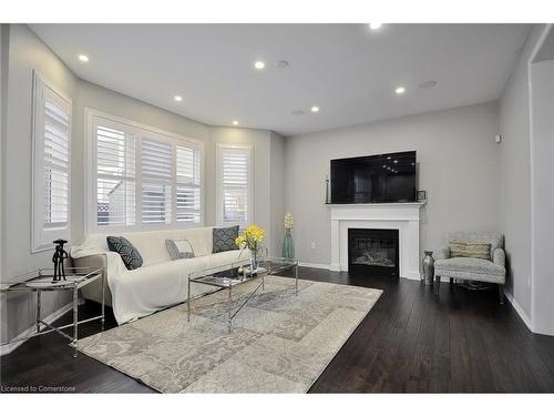 56 Henwood Drive, Cambridge, ON - Indoor Photo Showing Living Room With Fireplace