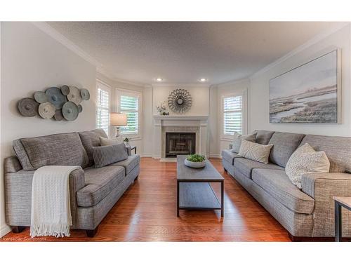 2-410 Craigleith Drive, Waterloo, ON - Indoor Photo Showing Living Room With Fireplace