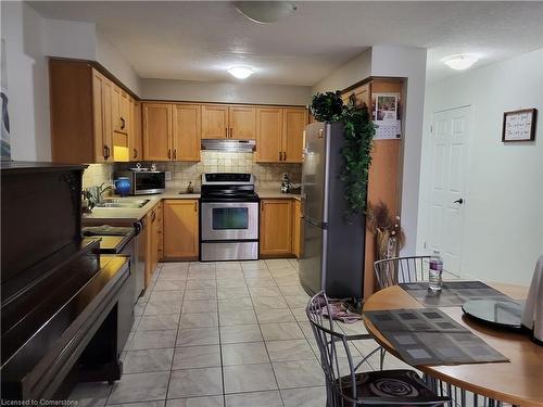 E34-85 Bankside Drive, Kitchener, ON - Indoor Photo Showing Kitchen With Double Sink