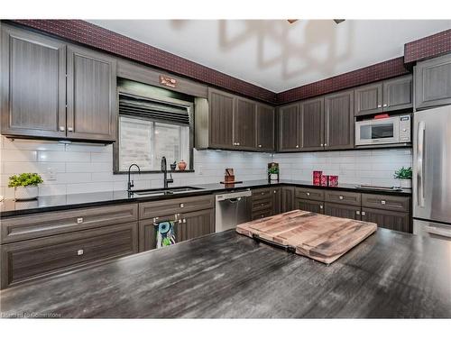 565 Sundew Drive, Waterloo, ON - Indoor Photo Showing Kitchen With Double Sink