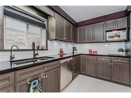 565 Sundew Drive, Waterloo, ON - Indoor Photo Showing Kitchen With Double Sink