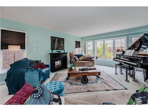 565 Sundew Drive, Waterloo, ON - Indoor Photo Showing Living Room With Fireplace