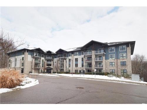 407-50 Bryan Court, Kitchener, ON - Outdoor With Balcony With Facade