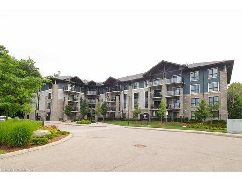 407-50 Bryan Court, Kitchener, ON - Outdoor With Balcony With Facade