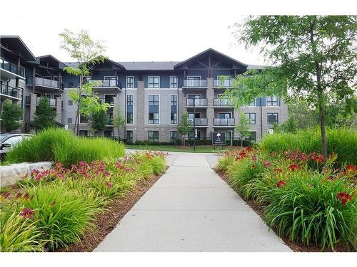 407-50 Bryan Court, Kitchener, ON - Outdoor With Balcony With Facade