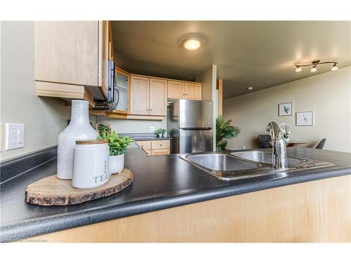 207-3 Father David Bauer Drive, Waterloo, ON - Indoor Photo Showing Kitchen With Double Sink