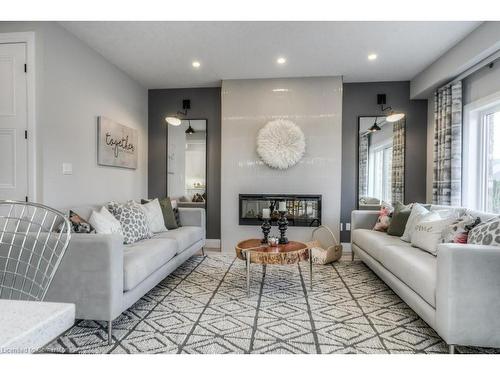 205 Applewood Street, Plattsville, ON - Indoor Photo Showing Living Room With Fireplace