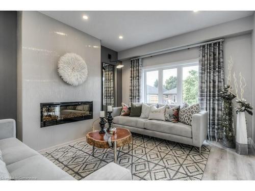 205 Applewood Street, Plattsville, ON - Indoor Photo Showing Living Room With Fireplace