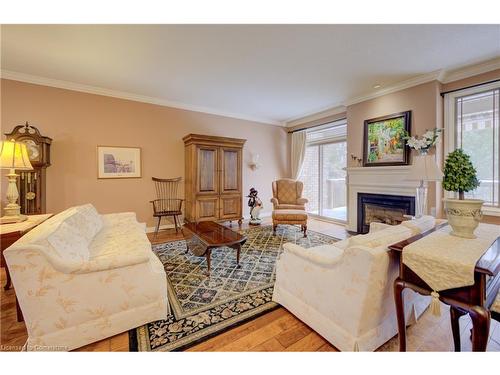 69-20 Isherwood Avenue, Cambridge, ON - Indoor Photo Showing Living Room With Fireplace