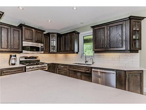 174 River Run Road, Drayton, ON - Indoor Photo Showing Kitchen With Double Sink