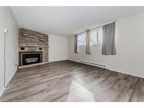 72 Obermeyer Drive, Kitchener, ON - Indoor Photo Showing Living Room With Fireplace