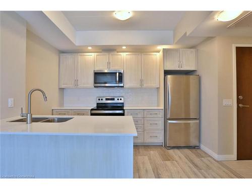 1712-108 Garment Street, Kitchener, ON - Indoor Photo Showing Kitchen With Double Sink With Upgraded Kitchen