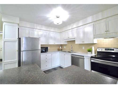 76-30 Imperial Road S, Guelph, ON - Indoor Photo Showing Kitchen With Double Sink