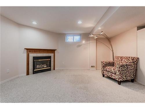 27 Stiefelmeyer Crescent, Baden, ON - Indoor Photo Showing Basement With Fireplace