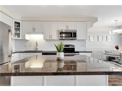 C-25 Sienna Street, Kitchener, ON - Indoor Photo Showing Kitchen With Stainless Steel Kitchen With Upgraded Kitchen