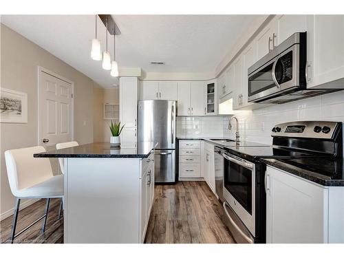 C-25 Sienna Street, Kitchener, ON - Indoor Photo Showing Kitchen With Stainless Steel Kitchen With Upgraded Kitchen