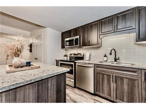 D-20 Sienna Street, Kitchener, ON - Indoor Photo Showing Kitchen With Stainless Steel Kitchen With Upgraded Kitchen