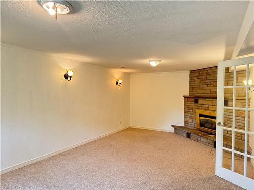 528 Havelock Drive, Waterloo, ON - Indoor Photo Showing Other Room With Fireplace